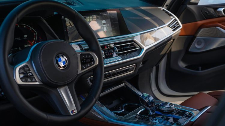 White BMW X7 M50i Rental Car Interior